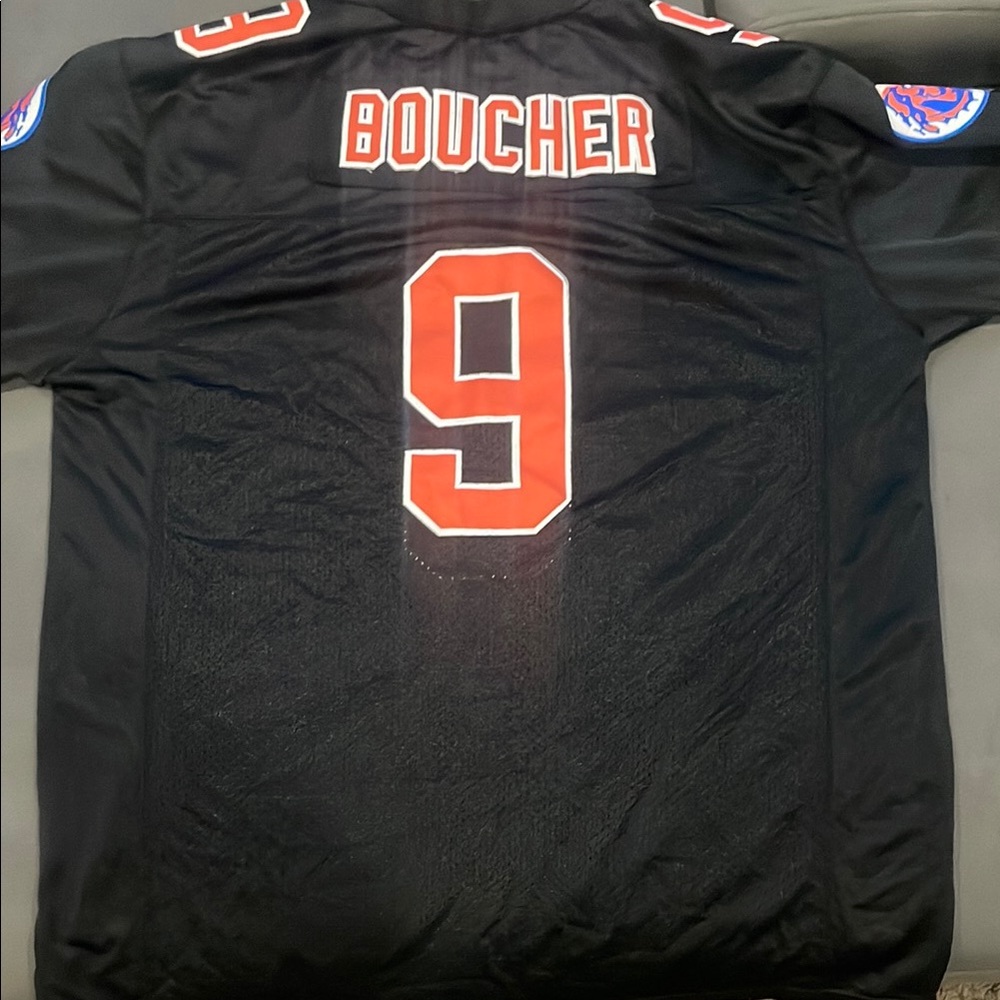 Black Jersey with Red Number 9